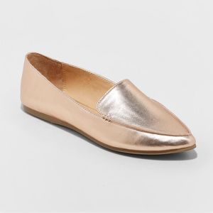 Women’s rose gold flats
